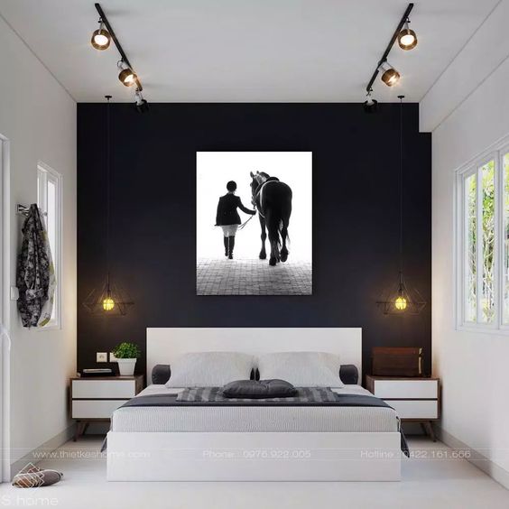 black accent wall in small bedroom