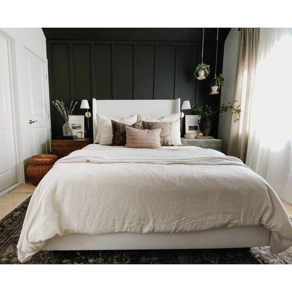 black accent wall in small bedroom