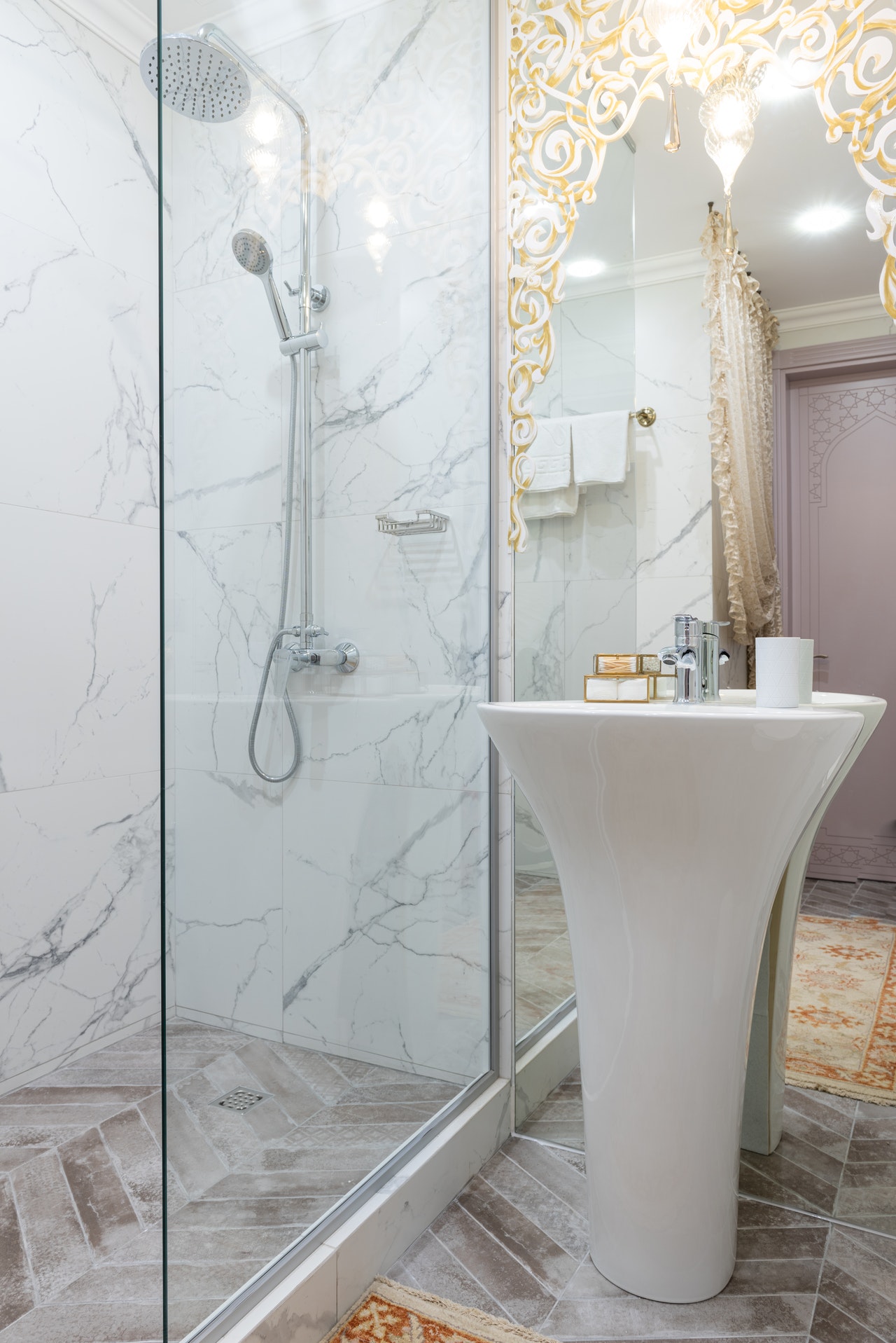 full length mirror placed in front of door in small bathroom