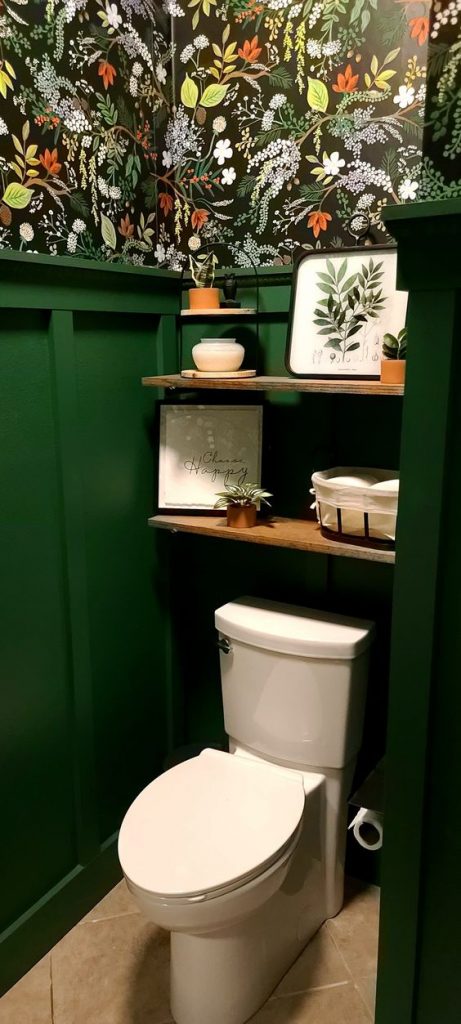 eclectic dark green and floral powder room
