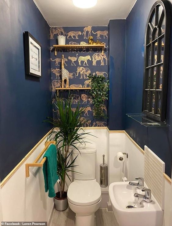 dark deep blue powder room