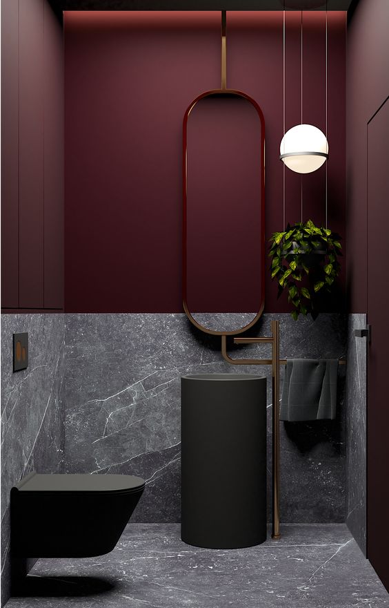 deep burgundy moody powder room
