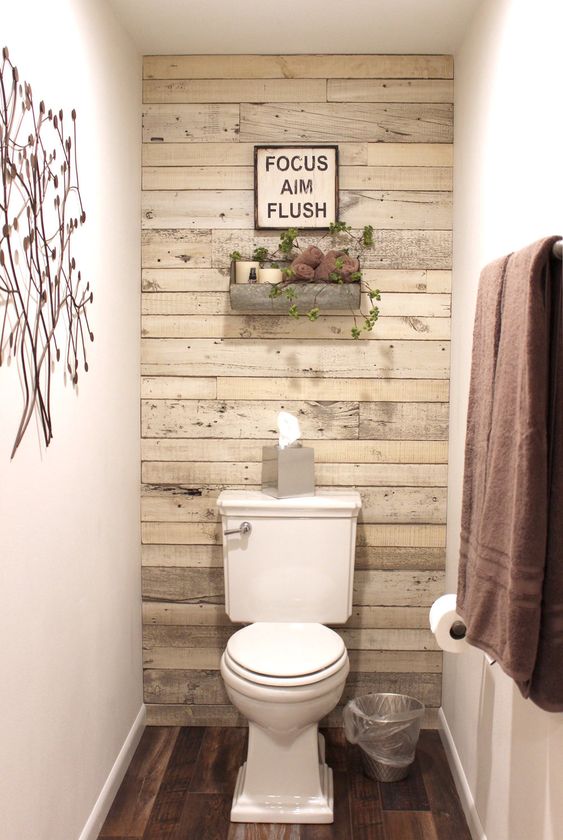 wood panel feature wall in small bathroom