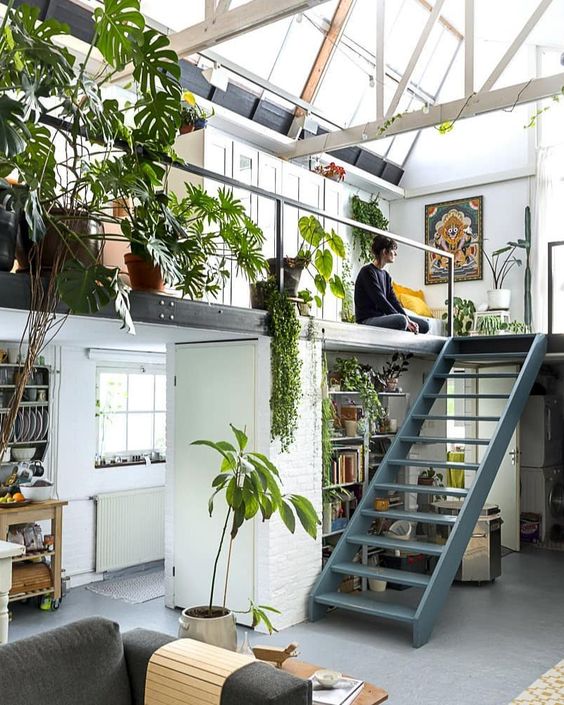 loft apartment with a lot of plants